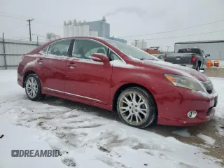2010 Lexus HS 250h with VIN JTHBB1BA9A2005121, listed as a Copart auction lot 87825175 with 124,594 mi miles and Salvage Title. Bid and sale history available at DreamBid. Image 4.