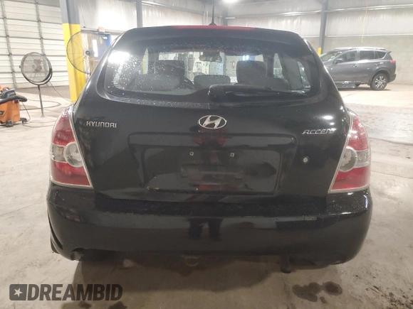 2010 Hyundai Accent SE with VIN KMHCN3AC8AU181637, listed as a Copart auction lot 63095135 with 195,945 mi miles and Salvage title. Bid and sale history available at DreamBid. Image 6.