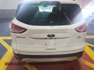 2014 Ford Escape SE z VIN 1FMCU9GX7EUC02600, wystawiony jako IAAI lot #42570755 z przebiegiem 86 871 mil mil oraz . Historia ofert i sprzedaży dostępna na DreamBid. Obrazek 13.