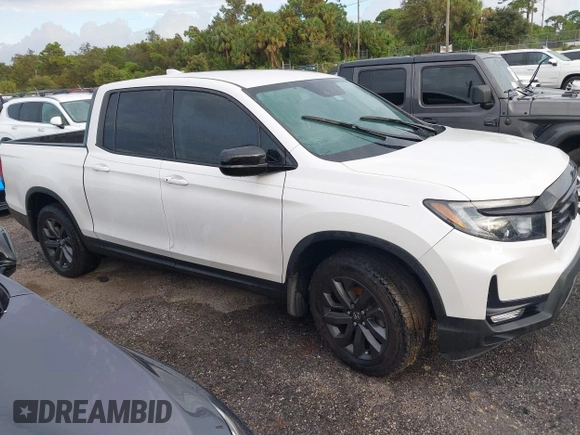 2023 Honda Ridgeline Sport z VIN 5FPYK3F14PB049364, wystawiony jako IAAI lot #40474507 z przebiegiem Nie podano mil oraz . Historia ofert i sprzedaży dostępna na DreamBid. Obrazek 13.