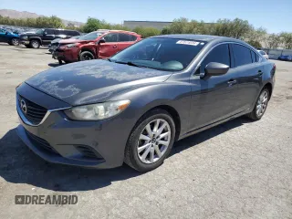 2014 Mazda 6 i Sport with VIN JM1GJ1U6XE1135651, listed as a Copart auction lot 67674034 with 220,785 mi miles and Salvage Title. Bid and sale history available at carsss.com. Image 1.