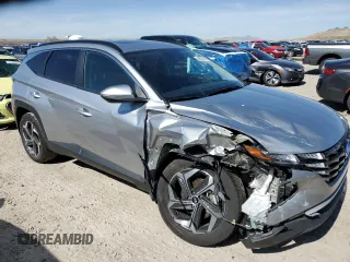 2022 Hyundai Tucson SEL with VIN 5NMJFCAE7NH089359, listed as a Copart auction lot 48527075 with 73,938 mi miles and Salvage Title. Bid and sale history available at DreamBid. Image 4.
