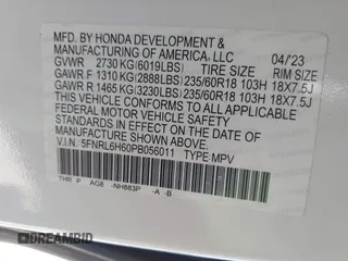 2023 Honda Odyssey EX-L with VIN 5FNRL6H60PB056011, listed as a IAAI auction lot 41667196 with 79,893 mi miles. Bid and sale history available at carsss.com. Image 9.