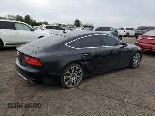 2012 Audi A7 Prestige с VIN WAU2GAFC4CN059522, выставлен на аукционе Copart как лот 53102935 с пробегом 145 401 миль миль и Списание • Salvage title. История ставок и продаж доступна на DreamBid. Изображение 3.