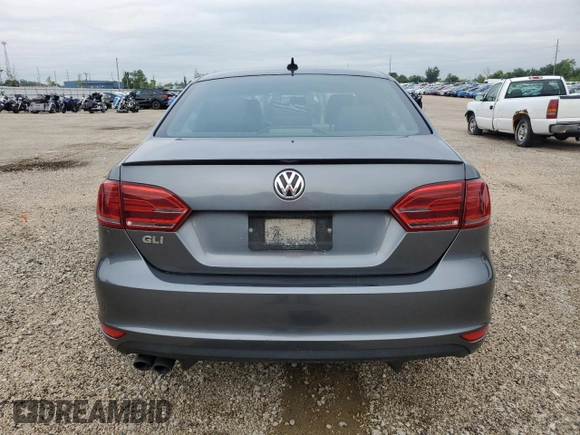 2014 Volkswagen Jetta GLI z VIN 3VW4T7AJ2EM245201, wystawiony jako Copart lot #64901935 z przebiegiem 147 799 mil mil oraz Czysty tytuł • Clean title. Historia ofert i sprzedaży dostępna na DreamBid. Obrazek 6.