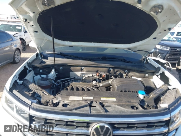 2021 Volkswagen Atlas SE with VIN 1V2PE2CA4MC203850, listed as a IAAI auction lot 41634034 with 56,336 mi miles and . Bid and sale history available at DreamBid. Image 10.