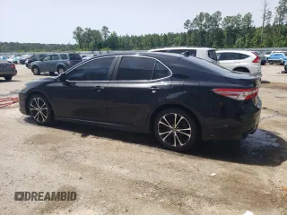 2018 Toyota Camry LE с VIN 4T1B11HKXJU656262, выставлен на аукционе Copart как лот 57132965 с пробегом 106 876 миль миль и Списание • Salvage title. История ставок и продаж доступна на DreamBid. Изображение 2.