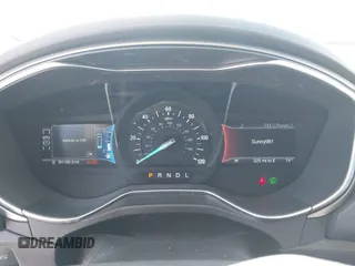 2016 Ford Fusion SE Hybrid z VIN 3FA6P0LU8GR203934, wystawiony jako IAAI lot #42595741 z przebiegiem 84 189 mil mil oraz . Historia ofert i sprzedaży dostępna na DreamBid. Obrazek 7.