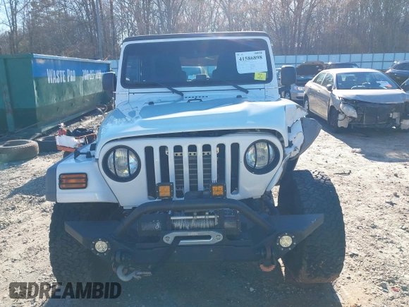 2005 Jeep Wrangler Unlimited with VIN 1J4FA44SX5P316055, listed as a IAAI auction lot 41586898 with 218,181 mi miles. Bid and sale history available at carsss.com. Image 12.