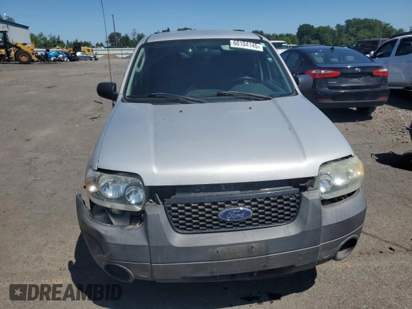 2005 Ford Escape XLS Value with VIN 1FMYU92Z55KC93604, listed as a Copart auction lot 60104145 with 86,788 mi miles and Salvage title. Bid and sale history available at DreamBid. Image 5.