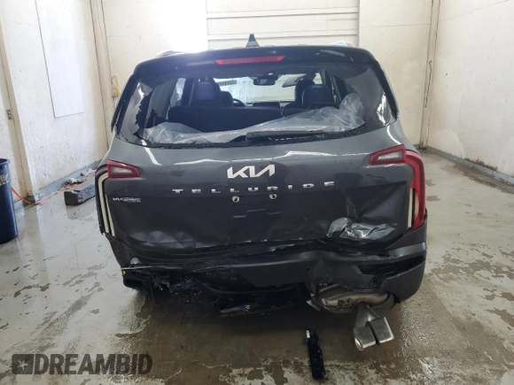 2022 Kia Telluride SX with VIN 5XYP54HC7NG276084, listed as a Copart auction lot 52690395 with 28,005 mi miles and Salvage title. Bid and sale history available at DreamBid. Image 6.