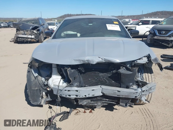 2022 Dodge Charger SXT with VIN 2C3CDXBG7NH208839, listed as a IAAI auction lot 41701171 with 71,552 mi miles and . Bid and sale history available at DreamBid. Image 13.