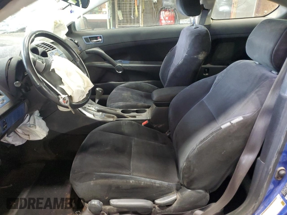 2006 Scion tC z VIN JTKDE167660131545, wystawiony jako Copart lot #54702365 z przebiegiem Nie podano mil oraz Szkoda całkowita • Salvage title. Historia ofert i sprzedaży dostępna na DreamBid. Obrazek 7.
