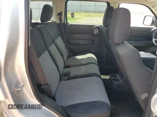 2008 Dodge Nitro SXT z VIN 1D8GU28K98W178732, wystawiony jako Copart lot #61411305 z przebiegiem 185 194 mil mil oraz Czysty tytuł • Clean title. Historia ofert i sprzedaży dostępna na DreamBid. Obrazek 11.