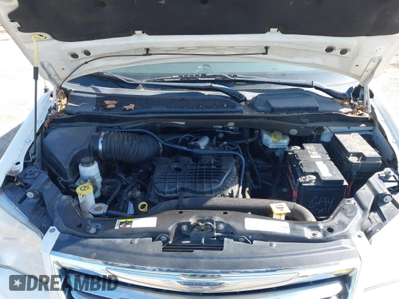 2013 Chrysler Town & Country Touring with VIN 2C4RC1BG4DR610462, listed as a IAAI auction lot 42173321 with 73,397 mi miles. Bid and sale history available at carsss.com. Image 10.