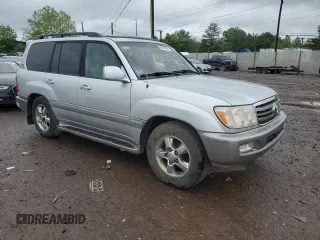 2006 Toyota Land Cruiser z VIN JTEHT05J262087016, wystawiony jako Copart lot #56294635 z przebiegiem 221 315 mil mil oraz Tytuł czysty. Historia ofert i sprzedaży dostępna na DreamBid. Obrazek 4.