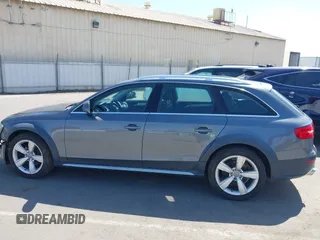 2013 Audi allroad A4 Premium Plus z VIN WA1UFAFL7DA044000, wystawiony jako IAAI lot #42346281 z przebiegiem 107 019 mil mil oraz . Historia ofert i sprzedaży dostępna na DreamBid. Obrazek 14.