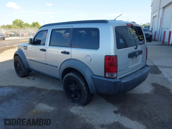 2007 Dodge Nitro SXT with VIN 1D8GT28K27W619313, listed as a IAAI auction lot 41917685 with 195,841 mi miles. Bid and sale history available at carsss.com. Image 3.
