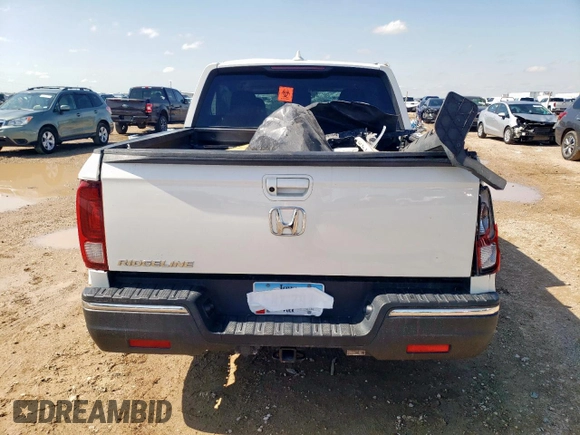 2017 Honda Ridgeline RTL with VIN 5FPYK2F52HB008083, listed as a Copart auction lot 58738935 with Not provided miles and Salvage title. Bid and sale history available at DreamBid. Image 6.