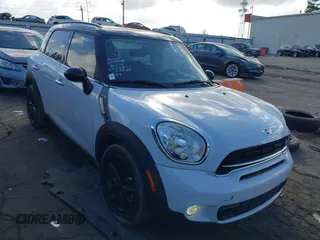 2015 MINI Countryman S z VIN WMWZC3C5XFWT06360, wystawiony jako IAAI lot #40774863 z przebiegiem 127 383 mil mil oraz . Historia ofert i sprzedaży dostępna na DreamBid. Obrazek 1.