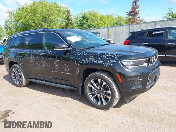 2021 Jeep Grand Cherokee Overland z VIN 1C4RJKDG9M8119728, wystawiony jako IAAI lot #42324696 z przebiegiem 48 379 mil mil oraz . Historia ofert i sprzedaży dostępna na DreamBid. Obrazek 1.