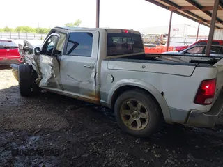 2009 Dodge 1500 Laramie z VIN 1D3HV13TX9J519720, wystawiony jako IAAI lot #42055968 z przebiegiem 190 226 mil mil oraz . Historia ofert i sprzedaży dostępna na DreamBid. Obrazek 3.