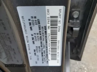 2024 Mazda 3 S Preferred with VIN JM1BPALM3R1657763, listed as a Copart auction lot 63000355 with 14,377 mi miles and Salvage title. Bid and sale history available at DreamBid. Image 12.