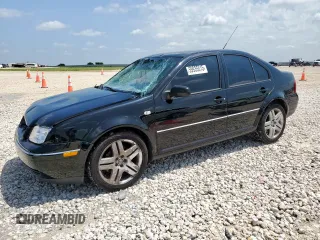 2004 Volkswagen Jetta GLS z VIN 3VWSE69M44M087341, wystawiony jako Copart lot #59935515 z przebiegiem 116 139 mil mil oraz Szkoda całkowita • Salvage title. Historia ofert i sprzedaży dostępna na DreamBid. Obrazek 1.