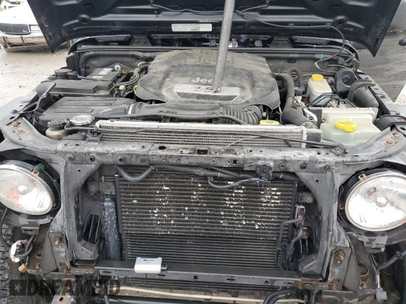 2013 Jeep Wrangler Sport with VIN 1C4AJWAG1DL538730, listed as a Copart auction lot 58784905 with 145,477 mi miles and Salvage title. Bid and sale history available at DreamBid. Image 11.