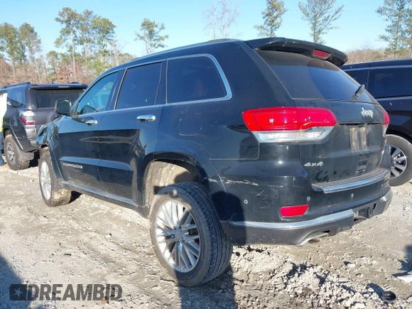 2018 Jeep Grand Cherokee Summit with VIN 1C4RJFJG1JC211047, listed as a IAAI auction lot 41133865 with 66,588 mi miles and . Bid and sale history available at DreamBid. Image 3.