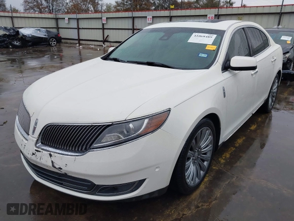 2013 Lincoln MKS with VIN 1LNHL9DK4DG605058, listed as a IAAI auction lot 41068489 with 101,801 mi miles. Bid and sale history available at carsss.com. Image 2.