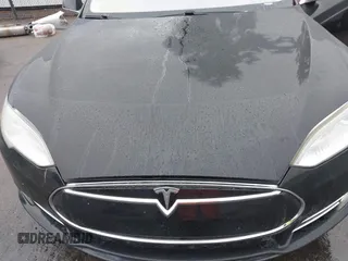 2013 Tesla Model S с VIN 5YJSA1CN0DFP20408, выставлен на аукционе IAAI как лот 41524470 с пробегом Не указан миль и . История ставок и продаж доступна на DreamBid. Изображение 10.
