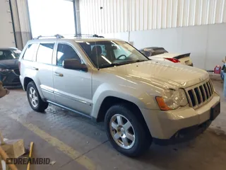 2010 Jeep Grand Cherokee Laredo with VIN 1J4RR4GT9AC106381, listed as a IAAI auction lot 41723268 with 180,008 mi miles. Bid and sale history available at carsss.com. Image 1.