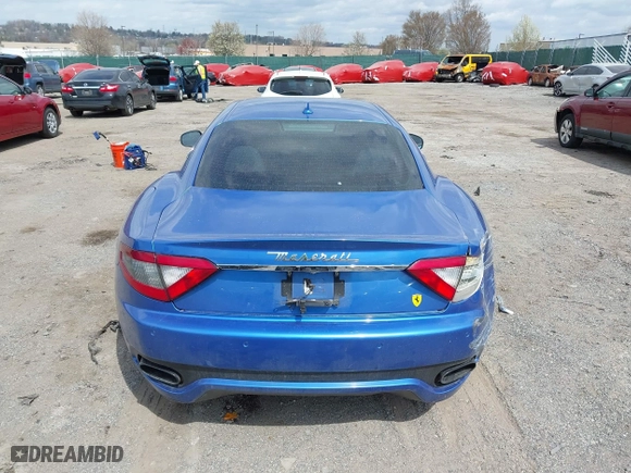 2013 Maserati GranTurismo Sport with VIN ZAM45VLA7D0073503, listed as a IAAI auction lot 41921102 with 53,436 mi miles. Bid and sale history available at carsss.com. Image 16.