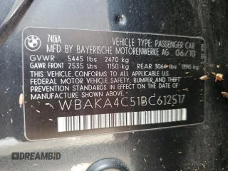2011 BMW 7 Series 740i z VIN WBAKA4C51BC612517, wystawiony jako Copart lot #76987474 z przebiegiem Nie podano mil oraz Szkoda całkowita • Salvage title. Historia ofert i sprzedaży dostępna na DreamBid. Obrazek 13.