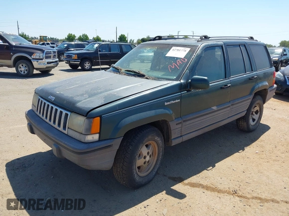1994 Jeep Grand Cherokee Laredo with VIN 1J4GZ58S2RC118502, listed as a IAAI auction lot 42701778 with 420,559 mi miles and . Bid and sale history available at DreamBid. Image 2.