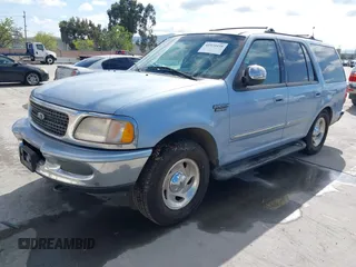 1998 Ford Expedition XLT z VIN 1FMPU18L8WLA56178, wystawiony jako IAAI lot #41920438 z przebiegiem 270 941 mil mil oraz . Historia ofert i sprzedaży dostępna na DreamBid. Obrazek 2.