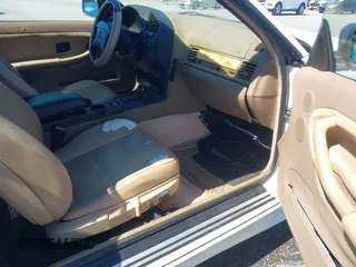 1996 BMW 3-Series 328IC with VIN WBABK8324TET92418, listed as a IAAI auction lot 41815664 with 128,661 mi miles. Bid and sale history available at carsss.com. Image 5.
