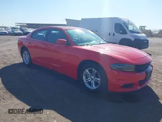2022 Dodge Charger SXT with VIN 2C3CDXBG8NH208316, listed as a IAAI auction lot 42099897 with 47,596 mi miles and . Bid and sale history available at carsss.com. Image 1.