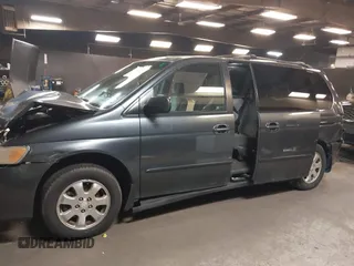 2004 Honda Odyssey EX-RES z VIN 5FNRL18814B092516, wystawiony jako IAAI lot #42108211 z przebiegiem 214 312 mil mil oraz . Historia ofert i sprzedaży dostępna na DreamBid. Obrazek 15.