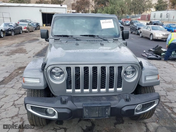 2021 Jeep Wrangler 4xe Unlimited Sahara with VIN 1C4JJXP64MW720263, listed as a IAAI auction lot 41514302 with 73,300 mi miles. Bid and sale history available at carsss.com. Image 13.