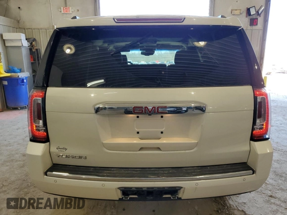 2015 GMC Yukon Denali with VIN 1GKS2CKJ7FR266750, listed as a Copart auction lot 47882125 with 121,705 mi miles and Salvage Title. Bid and sale history available at carsss.com. Image 6.