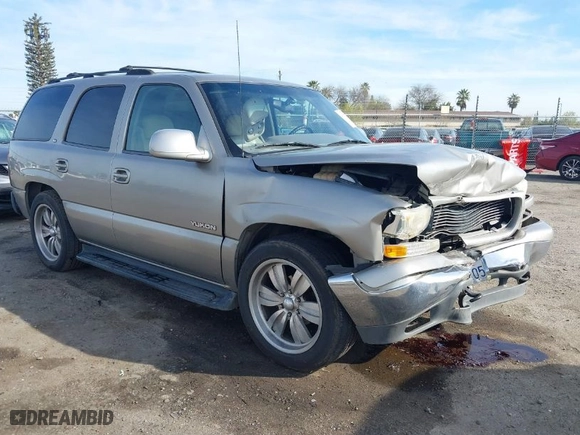 2001 GMC Yukon SLT with VIN 1GKEC13TX1J138735, listed as a IAAI auction lot 41719311 with 211,190 mi miles. Bid and sale history available at carsss.com. Image 13.