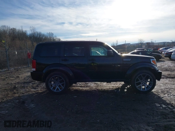 2007 Dodge Nitro SLT with VIN 1D8GT58K47W560542, listed as a IAAI auction lot 41218781 with 151,328 mi miles. Bid and sale history available at carsss.com. Image 13.