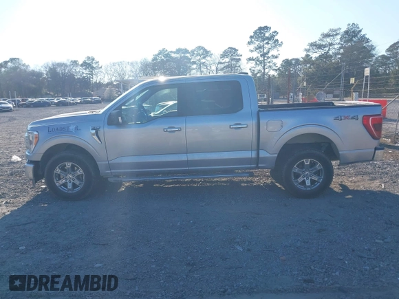 2021 Ford F-150 XL with VIN 1FTFW1E58MFA73753, listed as a IAAI auction lot 41707310 with 138,450 mi miles. Bid and sale history available at carsss.com. Image 14.