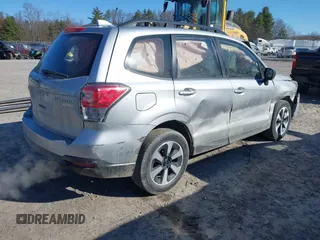 2017 Subaru Forester with VIN JF2SJABC3HH468807, listed as a IAAI auction lot 42042839 with 95,890 mi miles and . Bid and sale history available at DreamBid. Image 4.