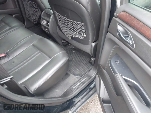 2014 Cadillac SRX Luxury Collection with VIN 3GYFNBE35ES569527, listed as a IAAI auction lot 41952555 with 152,978 mi miles and . Bid and sale history available at carsss.com. Image 8.