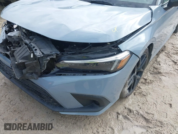 2023 Honda Civic Sport with VIN 2HGFE2F5XPH546709, listed as a IAAI auction lot 42453213 with 46,768 mi miles and . Bid and sale history available at DreamBid. Image 6.