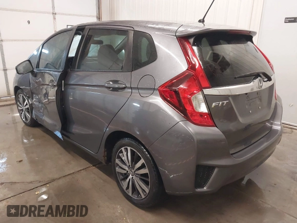2015 Honda Fit EX-L with VIN 3HGGK5H85FM755006, listed as a IAAI auction lot 41034606 with 97,294 mi miles and . Bid and sale history available at DreamBid. Image 3.