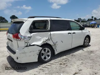2014 Toyota Sienna L with VIN 5TDZK3DC3ES430634, listed as a Copart auction lot 60715375 with 122,621 mi miles and Salvage title. Bid and sale history available at DreamBid. Image 3.